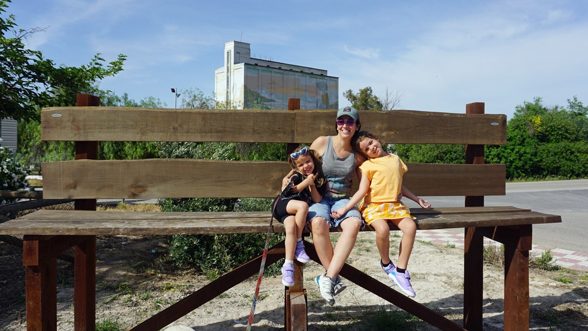 Family on the giant bench near the entrance to the laguna de Fuente de Piedra