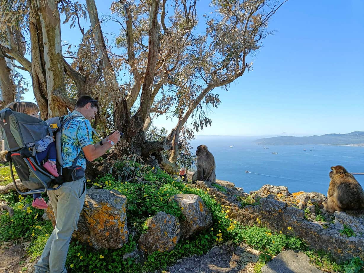 Mike with baby carrier on top of the rock in Gibraltar.