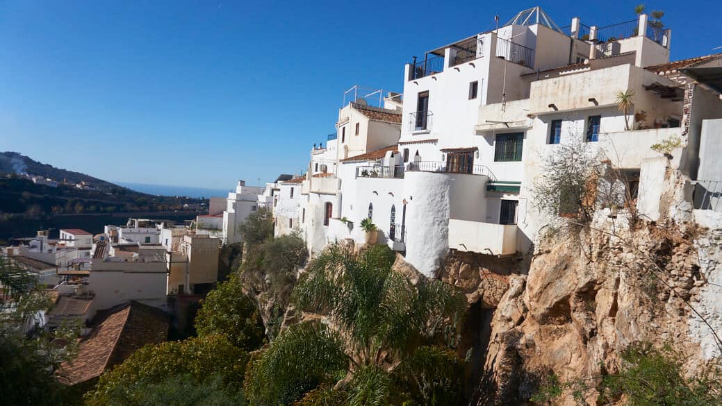 Houses hanging on edge of Competa, Malaga