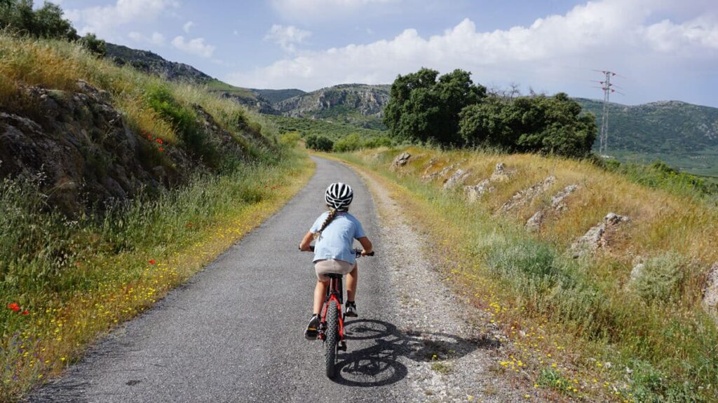 Girls riding down cycle track